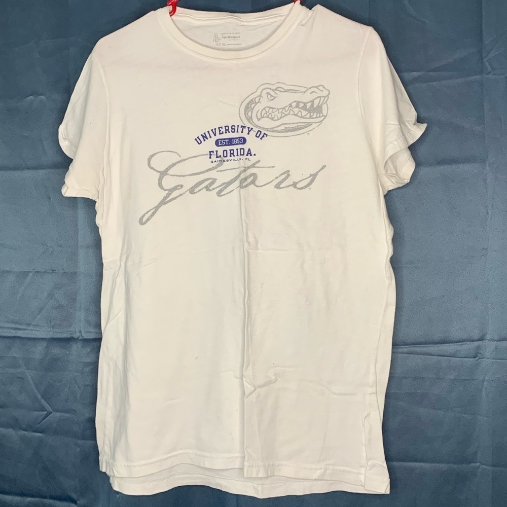 UNIVERSITY of Fl tee